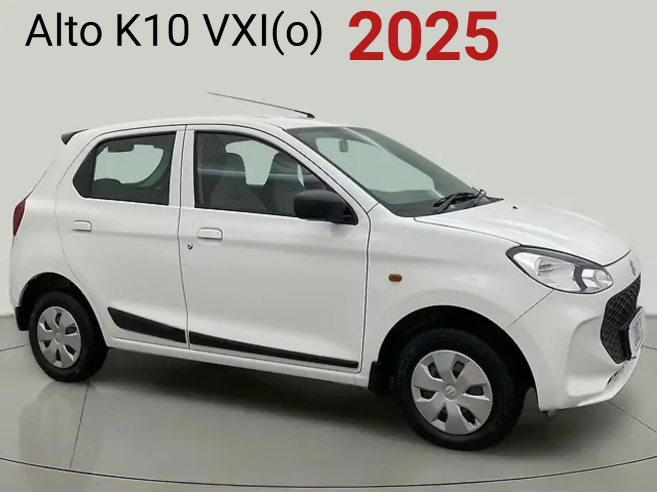 a white car parked on a white surface